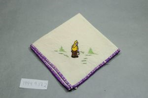 Image of Figure holding small bucket, one of a set of 3 embroidered napkins, each with single Inuit figure